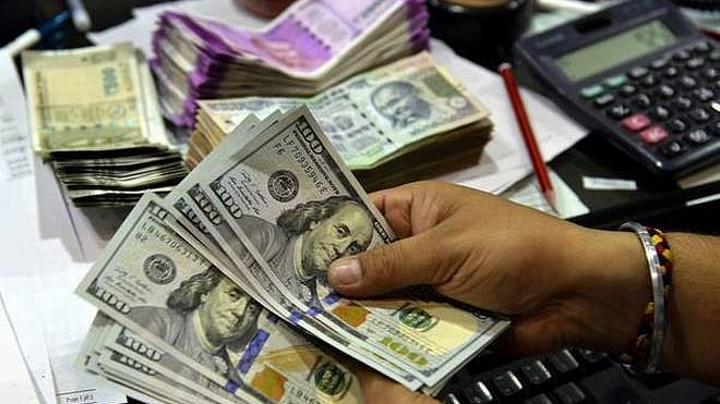 Rupee slips 29 paise against US dollar to 71.77