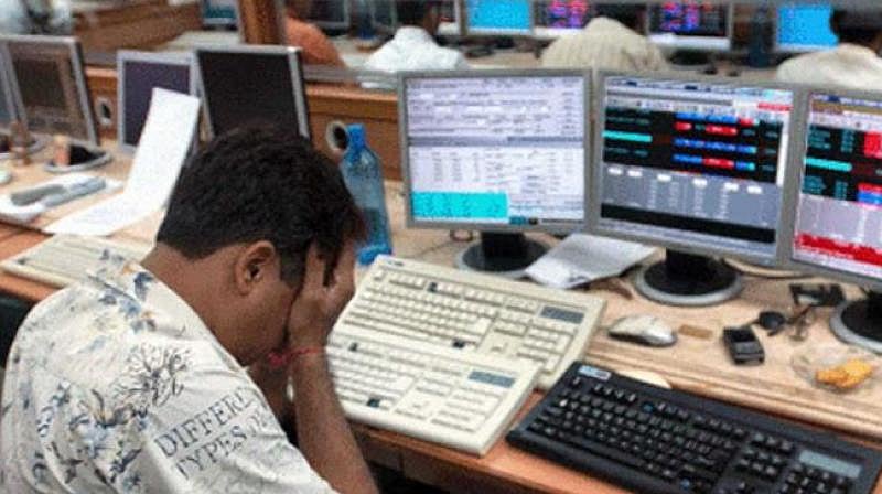 Markets open lower as global cues, FII selling weigh