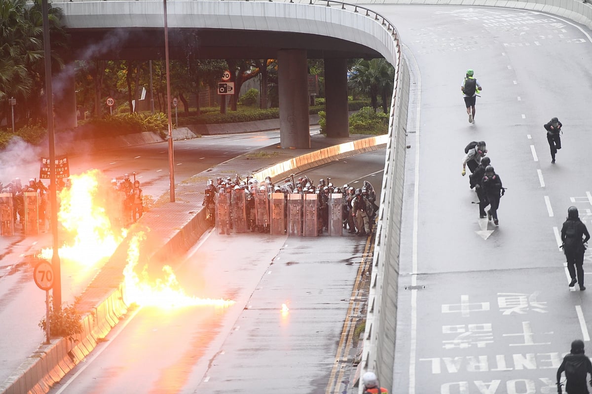 Water cannons, petrol bombs mark fresh unrest in Hong Kong 