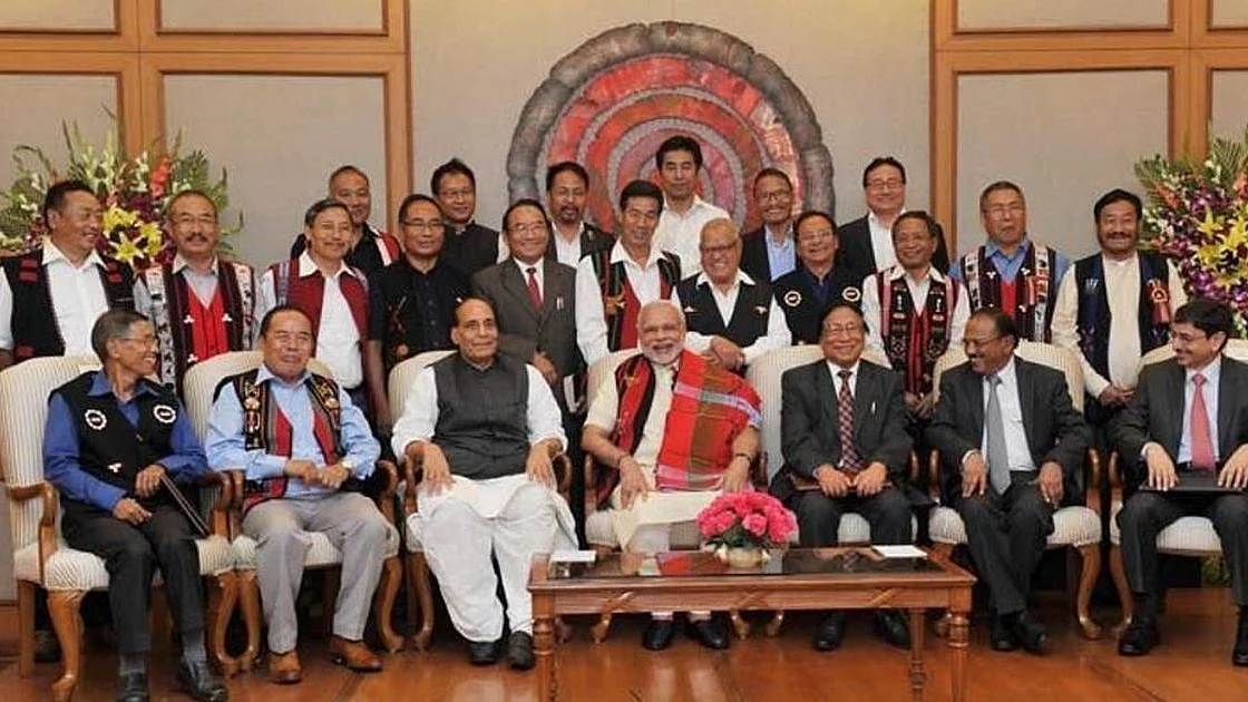 Prime Minister Narendra Modi and then Home Minister Rajnath Singh with Naga leaders after signing the framework for Naga peace agreement in 2015. (PTI photo).