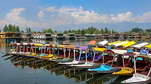 Tourists trapped in Kashmir as militancy and floods paralyse travel