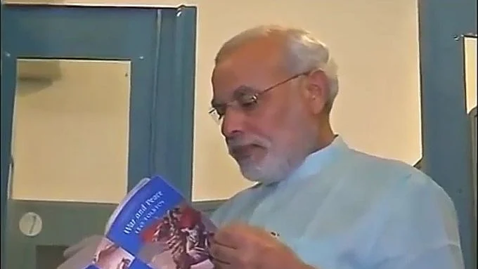 PM Modi flipping through Leo Tolstoy’s ‘War and Peace’