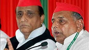 Samajwadi Party patriarch Mulayam Singh Yadav with his colleague Azam Khan (file photo, PTI).&nbsp;