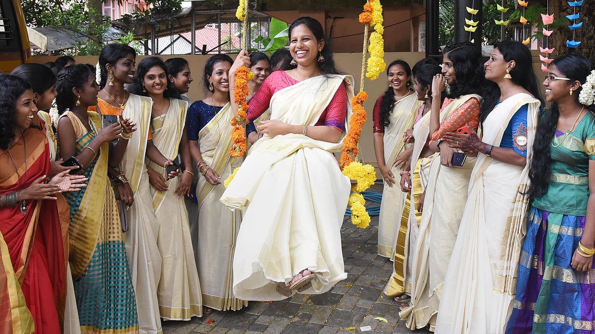 Kochi: College students dress in traditional clothes to celebrate Onam festival, in Kochi (PTI Photo)