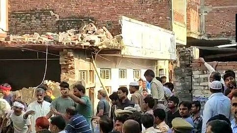 12 killed after a two-storey building collapsed following a cylinder blast in Mau, UP