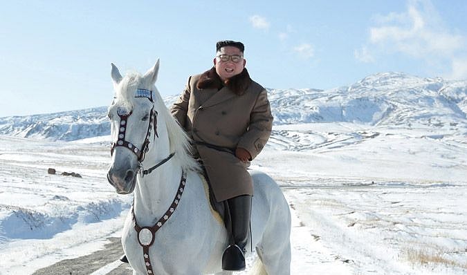 North Korean leader Kim rides white horse on sacred mountain