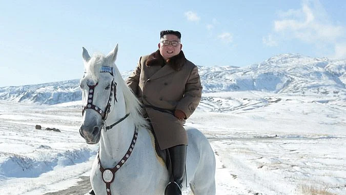 North Korean leader Kim rides white horse on sacred mountain