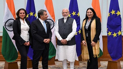 Madi Sharma (right) with PM Narendra Modi.