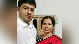 A file photo of the victim couple who were murdered along with their minor son.