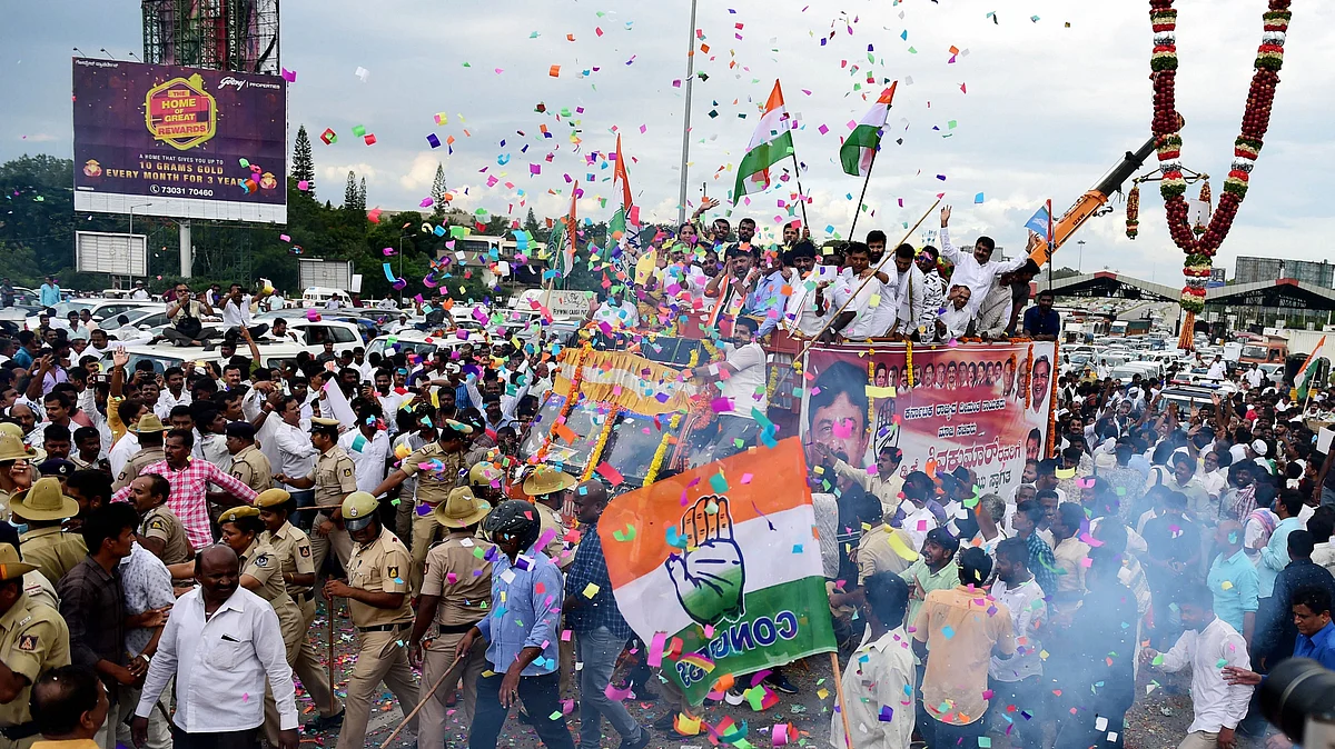 Congress leader D K Shivakumar being welcomed by his supporters on his arrival in Bengaluru on Saturday, Oct 26, 2019. (PTI Photo)