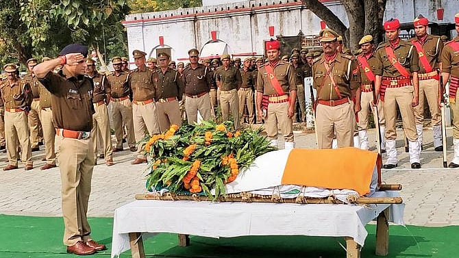 Police officers paying tribute to Inspector Subodh Kumar Singh (file photo)