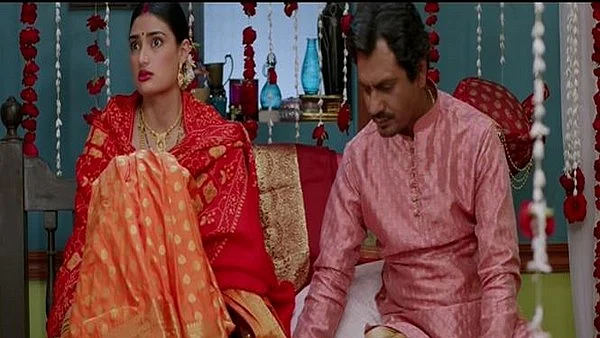 Nawazuddin Siddiqui and Athiya Shetty in a still from Motichoor Chaknachoor. 