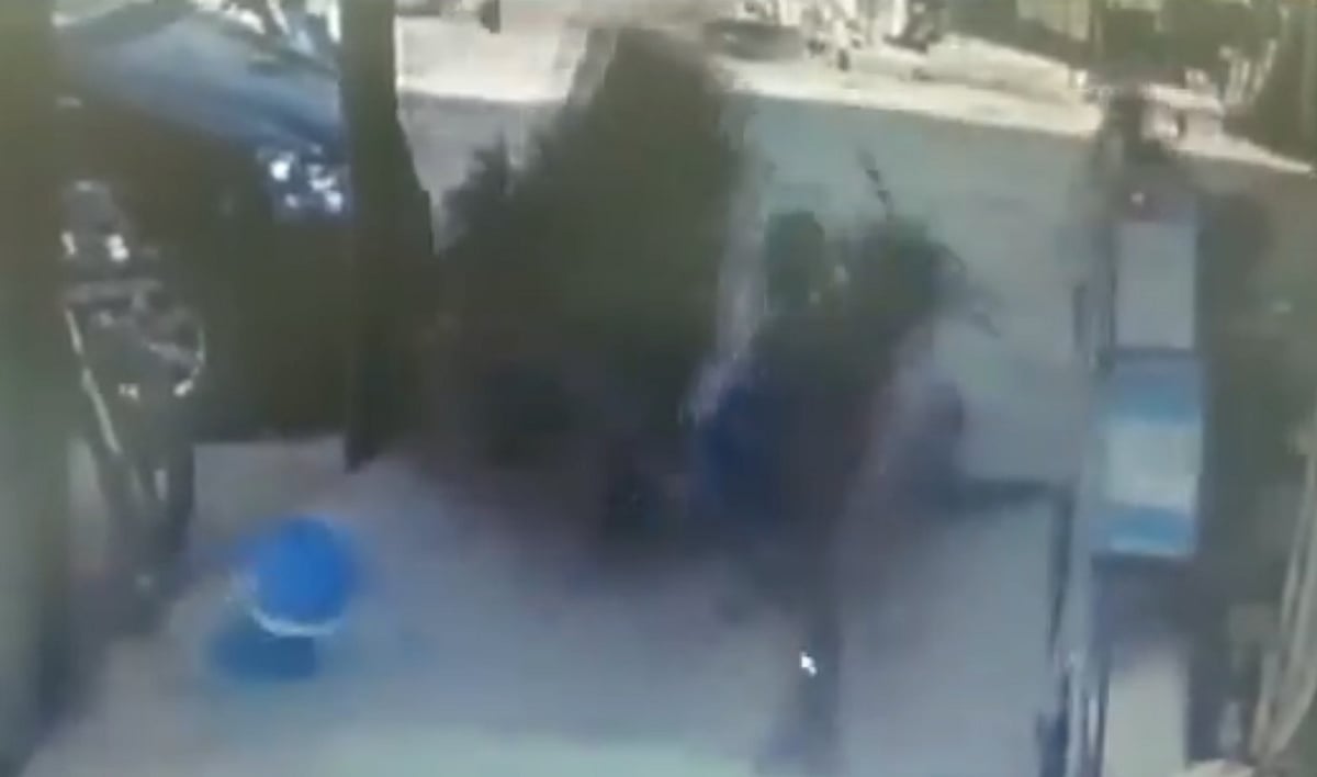 WATCH: Portion of a footpath built over a drain, collapses; 2 injured