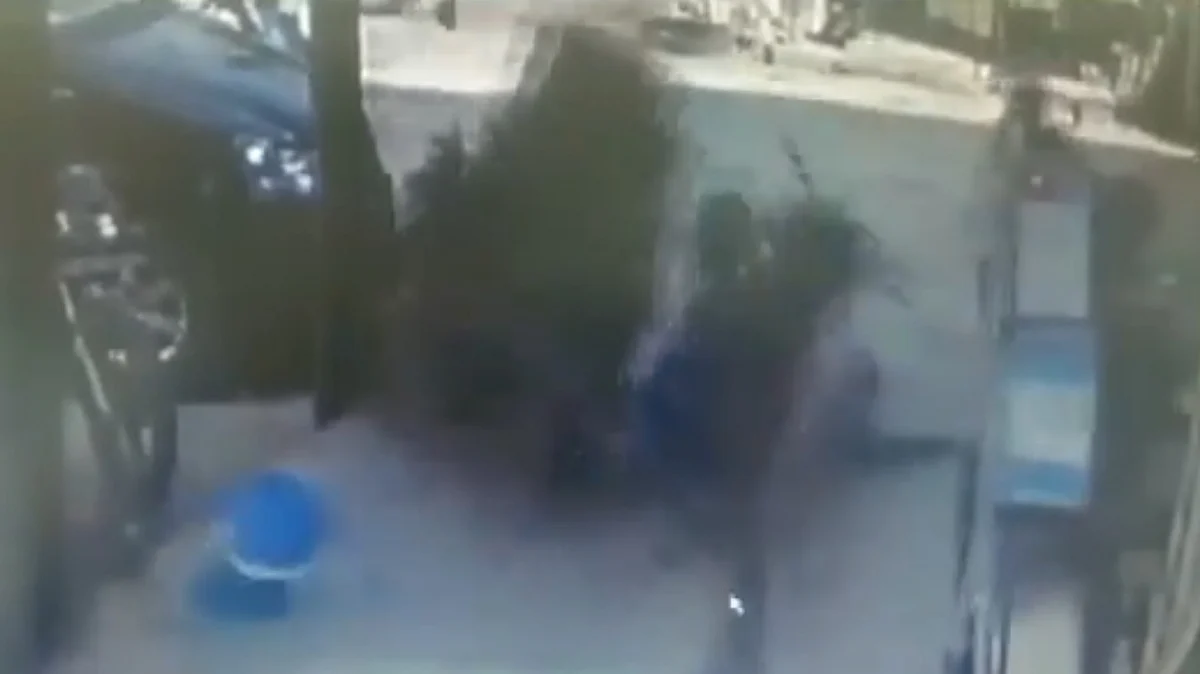 WATCH: Portion of a footpath built over a drain, collapses; 2 injured