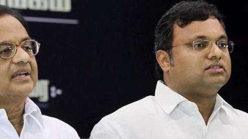 Former Union finance minister P Chidambaram and his son Karti (right)