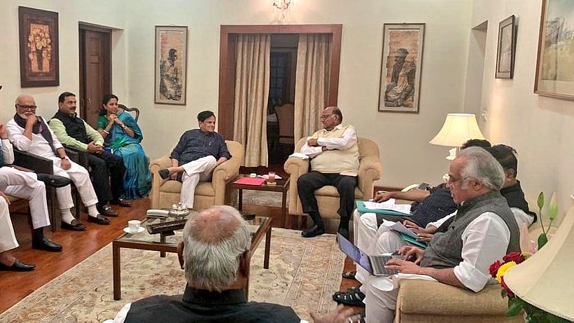  NCP chief Sharad Pawar with Congress leaders Ahmed Patel, KC Venugopal, Prithviraj Chavan and Jairam Ramesh during a meeting of both the parties at Pawar’s residence in New Delhi on Wednesday, Nov 20, 2019.