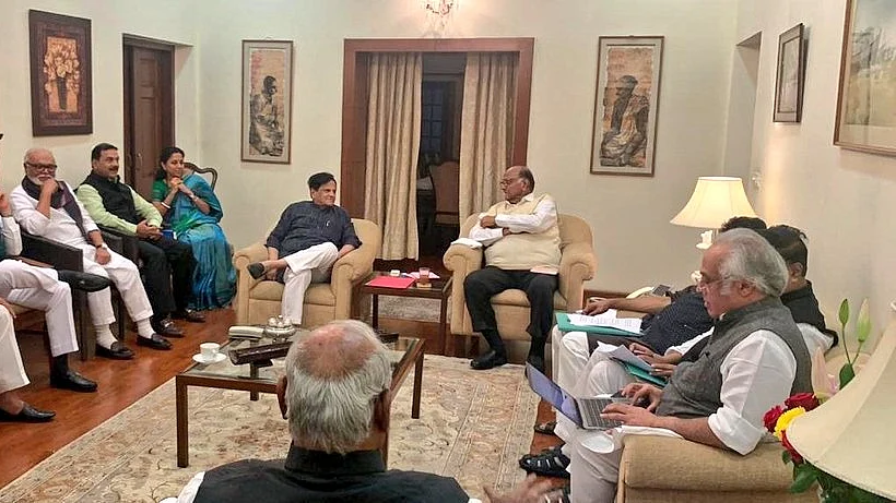 NCP chief Sharad Pawar with Congress leaders Ahmed Patel, KC Venugopal, Prithviraj Chavan and Jairam Ramesh during a meeting of both the parties at Pawar’s residence in New Delhi on Wednesday, Nov 20, 2019.
