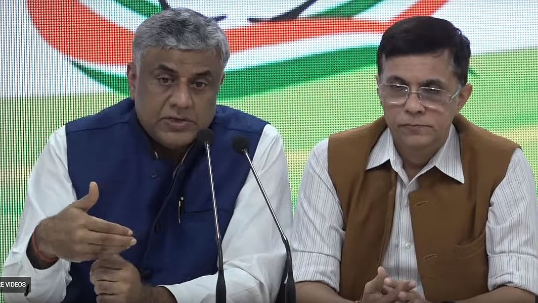 Congress MP Rajeev Gowda and spokesperson Pawan Khera (File photo)