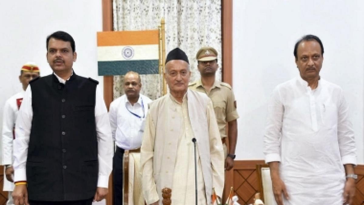 Devendra Fadnavis (left) and Ajit Pawar with Maharashtra Governor Bhagat Singh Koshyari after taking oath of office on Saturday, Nov 23, 2019.