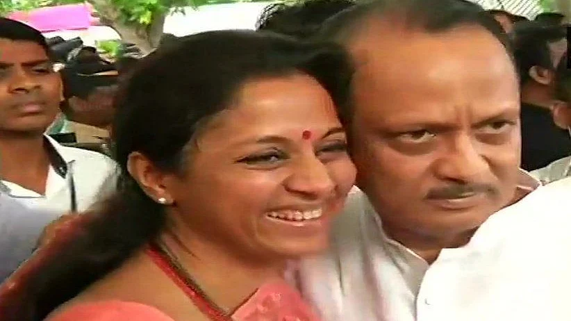 Supriya Sule greets cousin Ajit Pawar with a hug before Maharashtra session