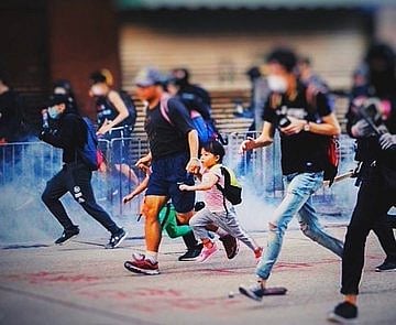 Hong Kong police say protesters out of control, deny curfew
