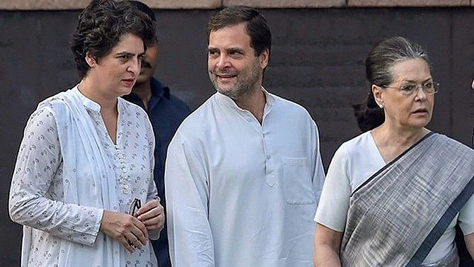(L-R) Priyanka and Rahul with Sonia Gandhi