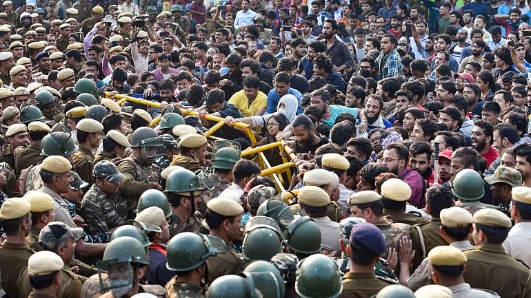 Partial roll back of fees-hike cuts no ice with JNU students