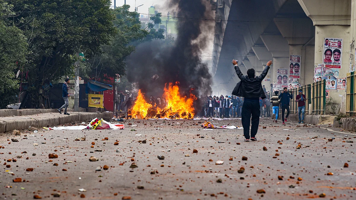 Brick-bats lie on a road during clashes between anti-CAA protestors and the police at Seelampur in New Delhi, Tuesday, Dec. 17, 2019. (PTI Photo)