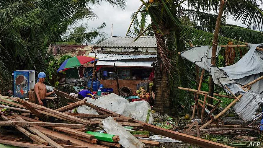 Toll in Philippines typhoon reaches 21