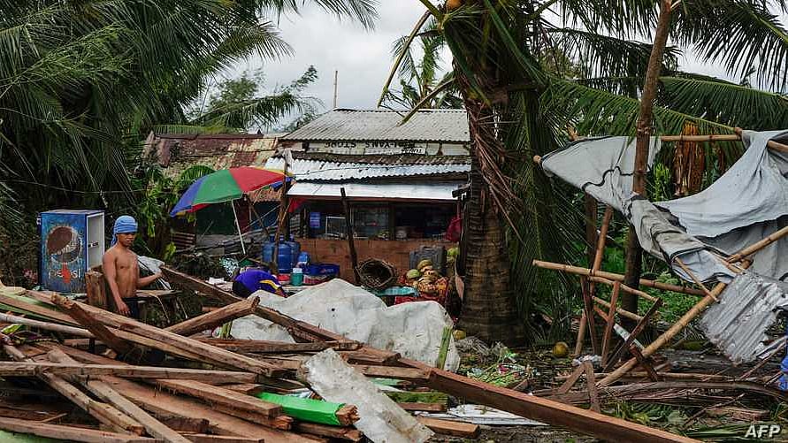 Toll in Philippines typhoon reaches 21