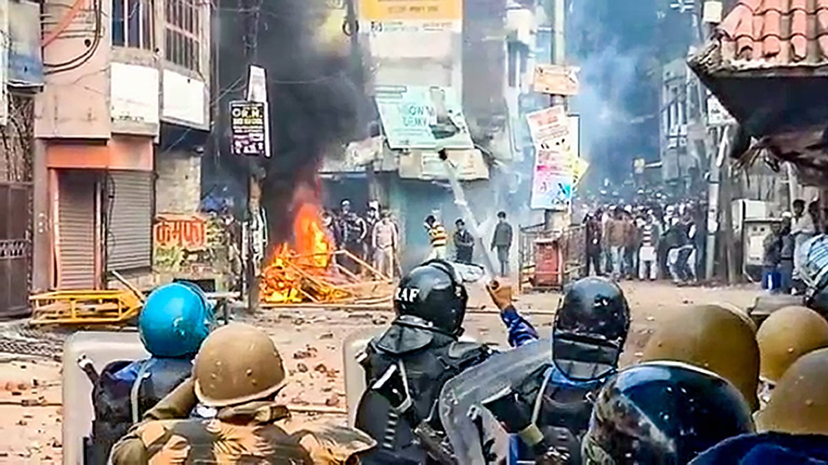 Police personnel clash with protesters demonstrating against the Citizenship Amendment Act in UP’s Rampur on Saturday, Dec 21, 2019. (PTI photo)