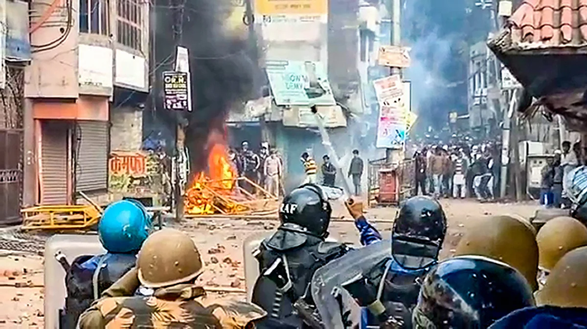 Police personnel clash with protesters demonstrating against the Citizenship Amendment Act in UP’s Rampur on Saturday, Dec 21, 2019. (PTI photo)