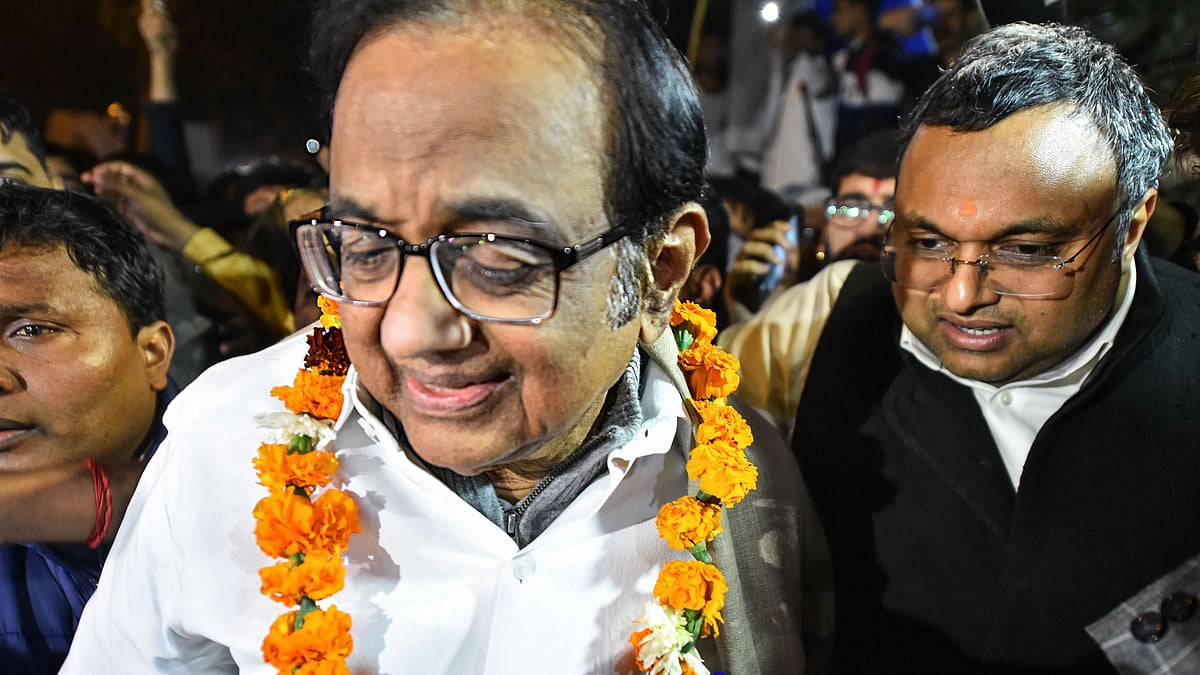 P Chidambaram being greeted by the party workers and supporters as he steps out of Tihar jail in New Delhi, Wednesday,&nbsp; Dec. 4, 2019. His son Karti is beside him (PTI photo)