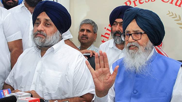 Sukhbir Badal with father Parkash Singh Badal (right). (PTI file photo)