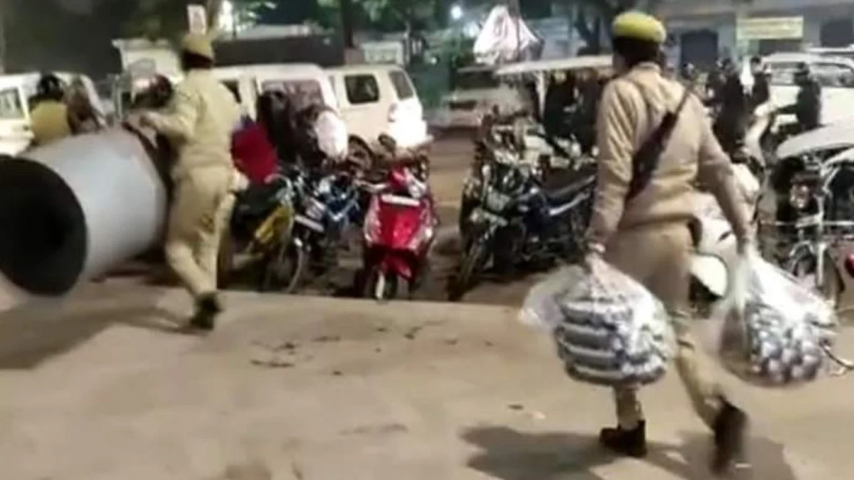 UP police taking away blankets from women protesters on Saturday night (Photo courtesy- social media)