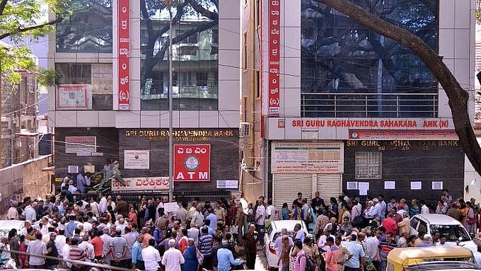 Fearing PMC bank like crisis, anxious depositors mill around Bengaluru Bank  after RBI caps withdrawal limit