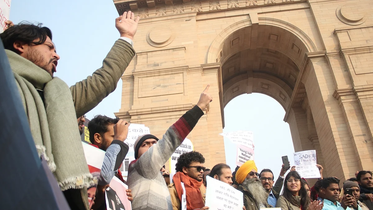 People protest against the Citizenship Amendment Act (CAA) and National Register of Citizens (NRC), at India Gate in New Delhi on January 1, 2020. (Photo: IANS)