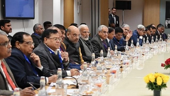 PM Modi and Home Minister Amit Shah with economists and experts ahead of budget session