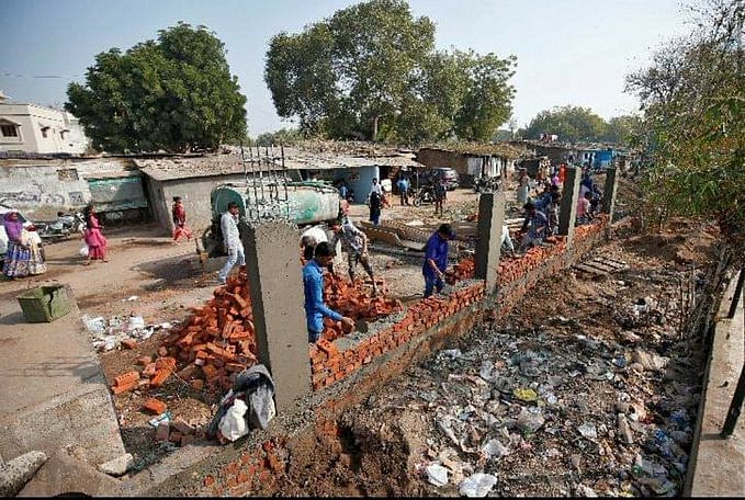 Twitterati ask Modi: 12 years CM of Gujarat, 6 years PM of India, still need a wall to hide  Gujarat Model?