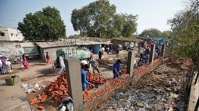 Twitterati ask Modi: 12 years CM of Gujarat, 6 years PM of India, still need a wall to hide  Gujarat Model?