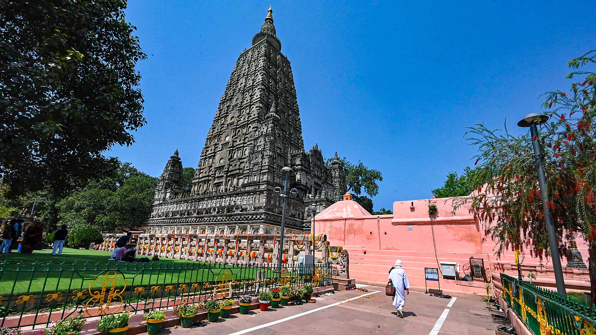 A devotee walks near Mahabodhi Temple in Bodh Gaya (photo: PTI)