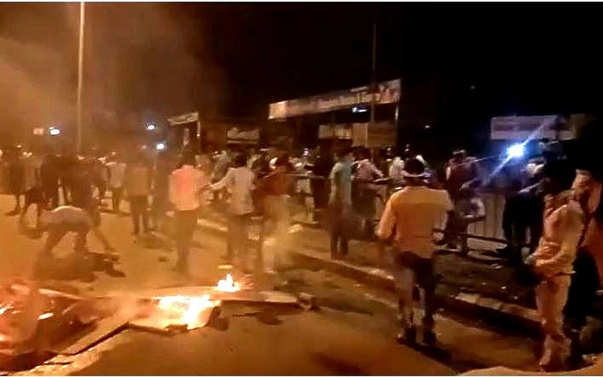 Stranded migrant workers in Surat set carts on fire, demand food, salary and transport