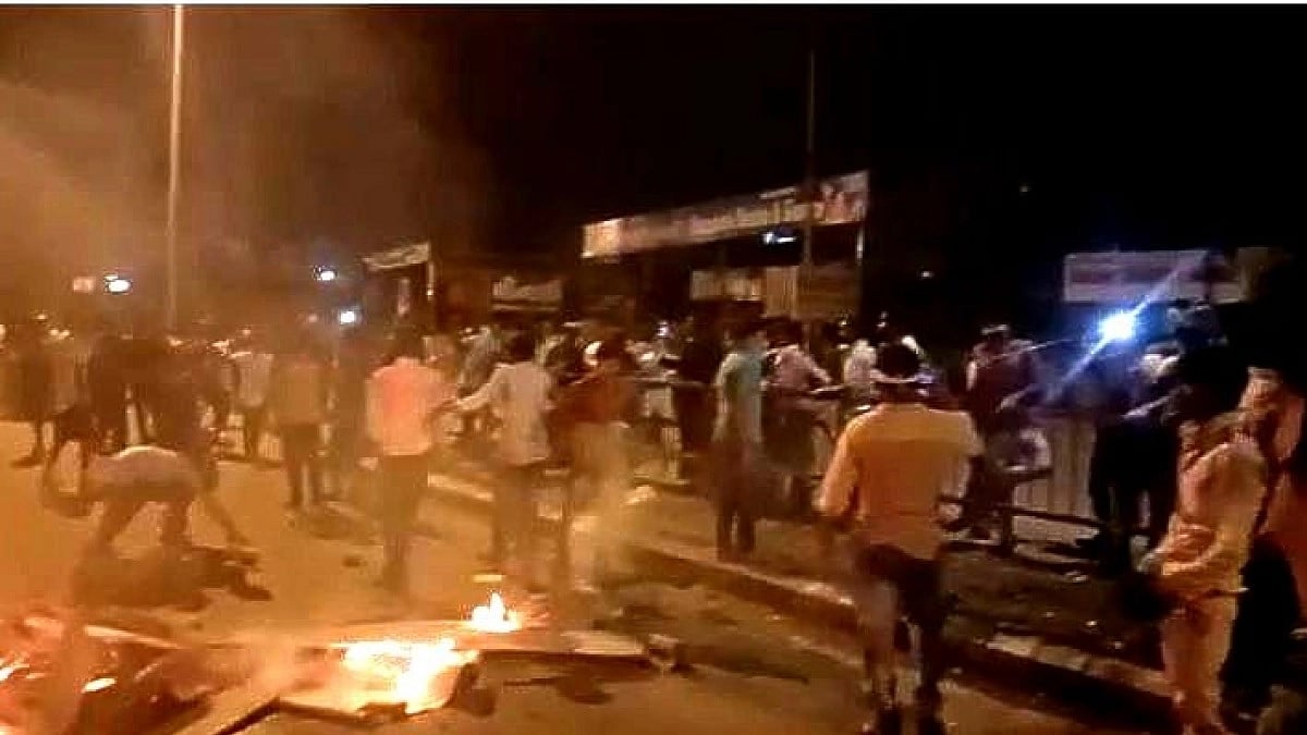 Stranded migrant workers in Surat set carts on fire, demand food, salary and transport