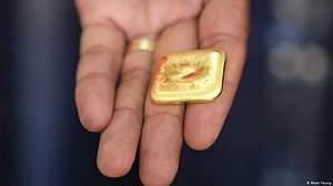 Gold declines Rs 557, silver tumbles Rs 1,606