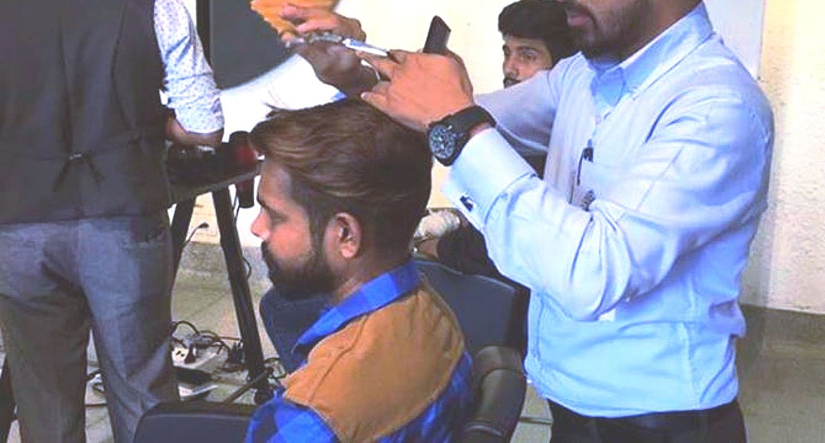 People throng barber shops in Bengaluru after 57 days lockdown