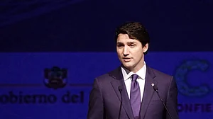 Canadian ruling party wins support to govern through 2025