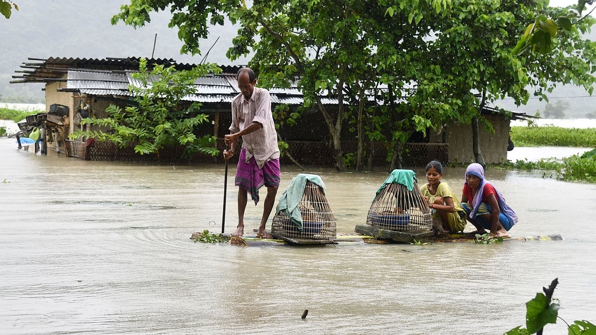 People move to higher places in flood hit Morigaon, Assam