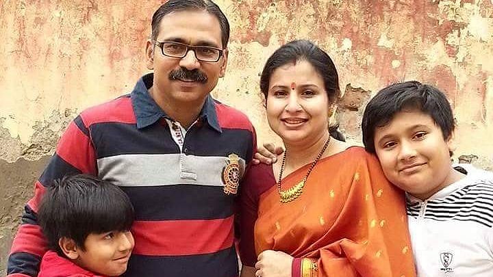 File photo of the slain SP Mukul Dwivedi with his family (Courtesy: Twitter)