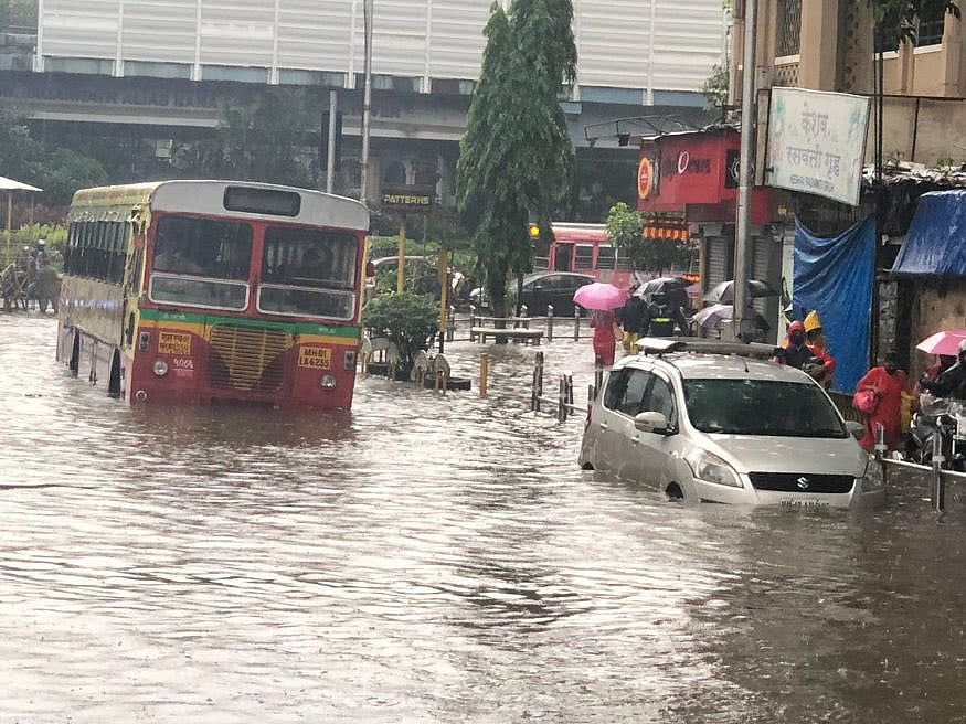 Heavy rains pound Mumbai, landslide hits road, rail traffic