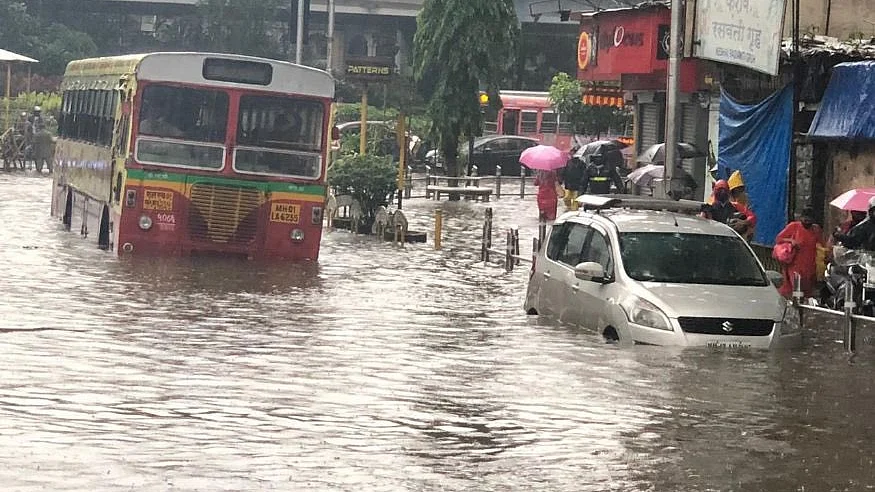 Heavy rains pound Mumbai, landslide hits road, rail traffic